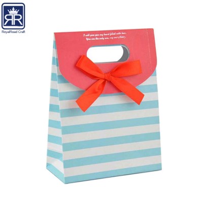 Yiwu market Wholesale ivory Board Colour Printing Paper Bags With ribbon Butterfly Knot For Party usage